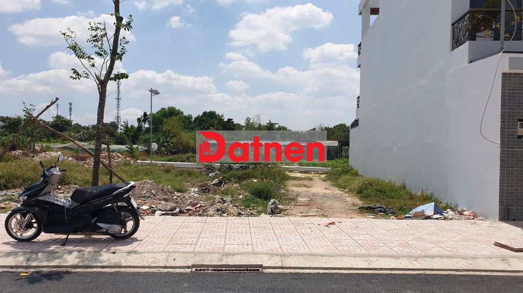 Đất full thổ DT 7.5m*12m, đường 14m gần chợ Hóc Môn, sổ hồng riêng