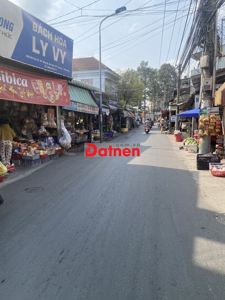 Bán lô đất ngay chợ , đương xe tải 777m(10x77) xây kho ,căn hộ dịch vụ
