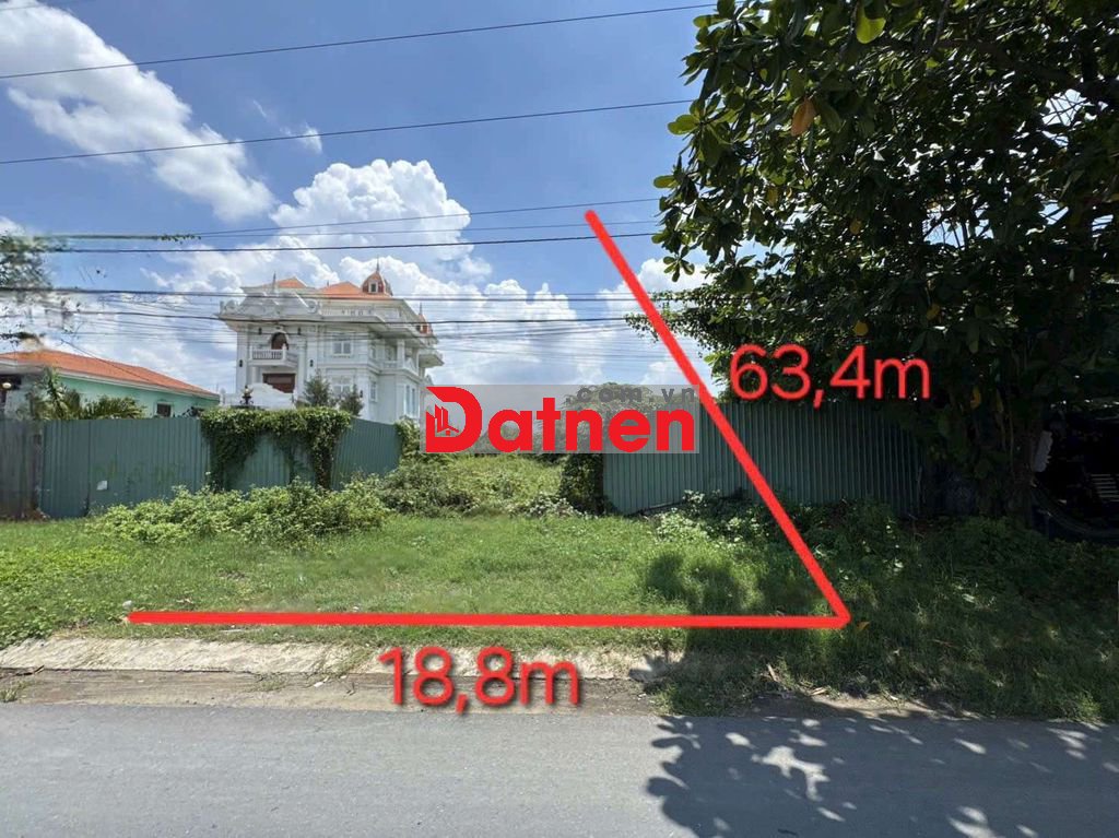 Bán đất mặt tiền đường QL1A, ngang 19m.